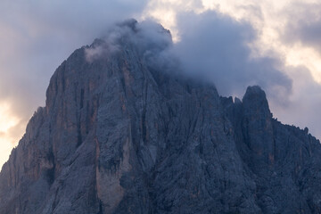 Mountain peak touches the clouds