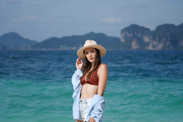 woman on the beach in krabi thailand, poda island, model shooting