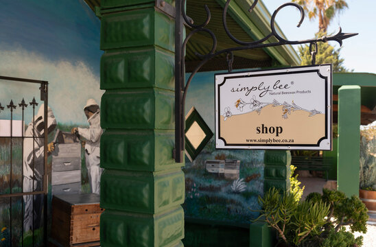 Hopefield, South Africa. 2023. Shop sign on the exterior of a store selling honey products.