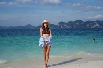 woman on the beach in krabi thailand, poda island, model shooting