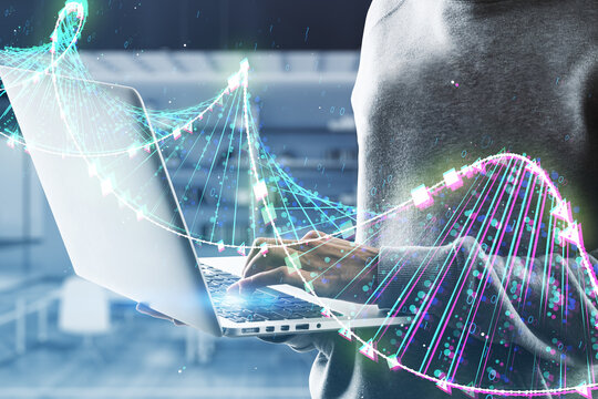 Close Up Of Hacker Using Laptop With Glowing Binary Code DNA Helix On Blurry Office Interior Background. Human Genome, Hacking, Phishing And Innovative Technologies Concept. Double Exposure.