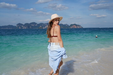 woman on the beach in krabi thailand, poda island, model shooting