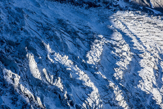 Glacier serac between light and shadow in Chamonix valley, Chamonix-Mont-Blanc, Haute-Savoie, France
