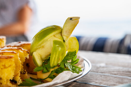 a turtle sculpture made out of and apple
