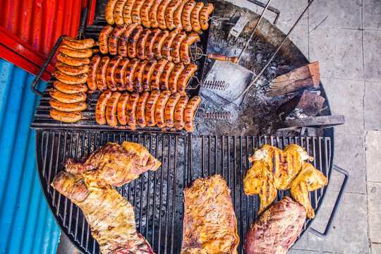 Argentinian Asado with assorted meats on a grill