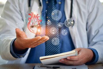 Cardiologist doctor examine patient heart functions and blood vessel on virtual interface. Medical technology.