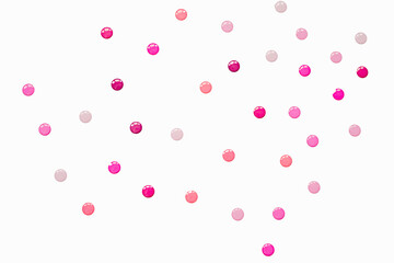 White basic background with chaotic identical dots of pink shades