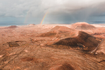 Fuerteventura sand volcano with rainbow