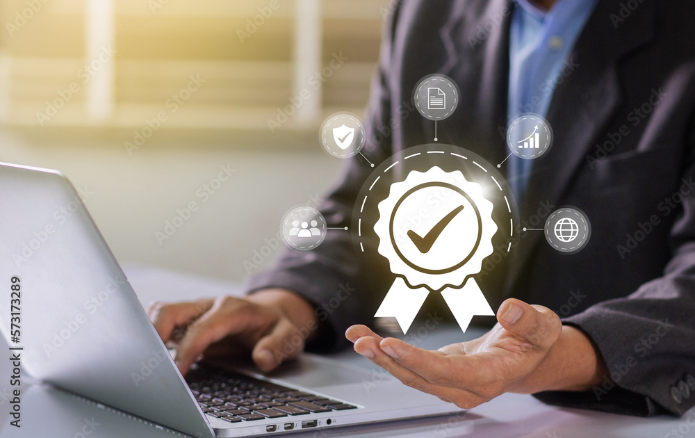 Poster Businessman working on labtop with check mark symbol and standard quality control. The concept of international standards and quality assurance is certified