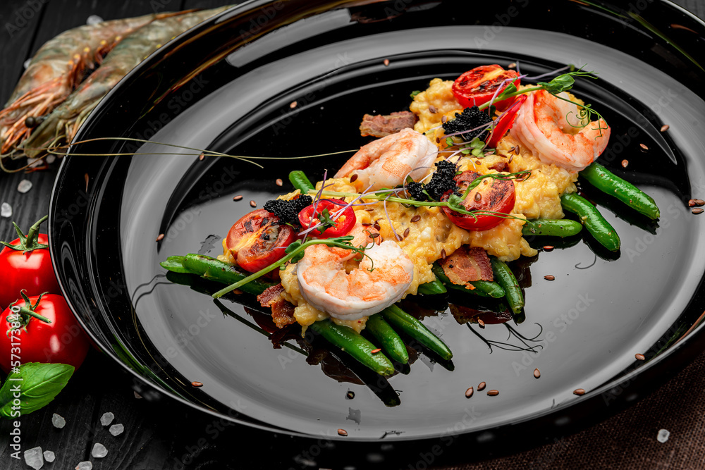 Canvas Prints Omelet with shrimp, caviar and grilled tomatoes on a bed of green beans and bacon