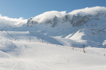 Fototapeta na wymiar Snowy mountain winter time. Winter landscape of mountains snow space 