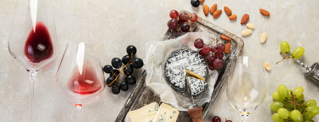 Wine, snacks and different various of cheese.