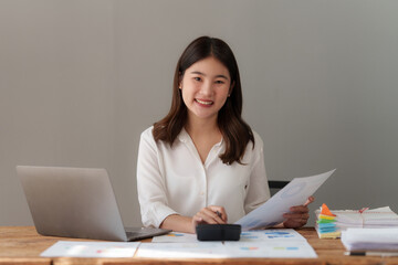 Beautiful business woman analyze fund investment. Business Consulting, Accounting, finance investment concept.