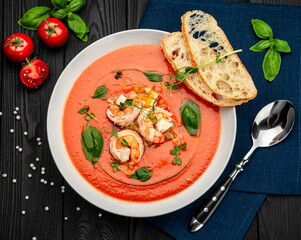 Delicious cold tomato soup or gazpacho with shrimps.