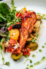 Grilled salmon fillet with vegetables mix.