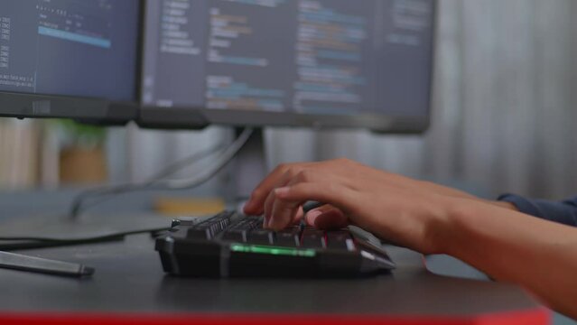 Close Up Of Teen Boy Programmer'S Hands Typing On Desktop Computer Creating Software Engineer Developing App, Program, Video Game At Home. Terminal With Coding Language 
