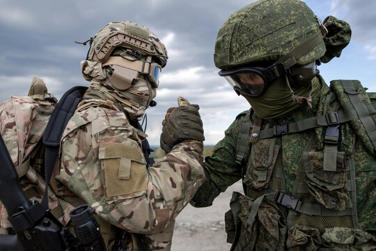 Handshake of two military soldiers