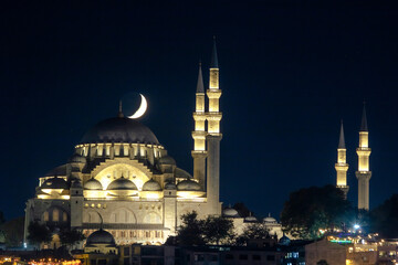 Fototapeta na wymiar Ramadan or islamic photo. Suleymaniye Mosque and crescent moon