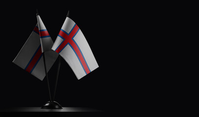 Small national flags of the Faroe Islands on a black background