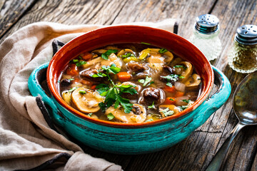 Mushroom soup on wooden table
