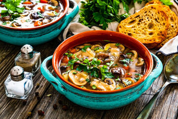 Mushroom soup on wooden table
