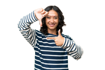 Young Argentinian woman over isolated background focusing face. Framing symbol