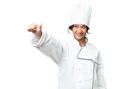 Young chef Argentinian woman over isolated background giving a thumbs up gesture