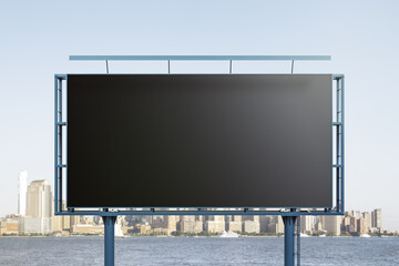 Blank black billboard on cityscape background, front view. Mock up, advertising concept
