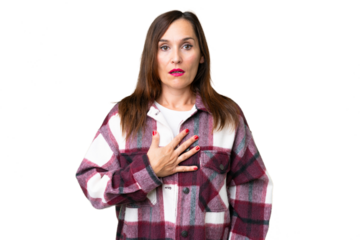 Middle age woman over isolated chroma key background surprised and shocked while looking right