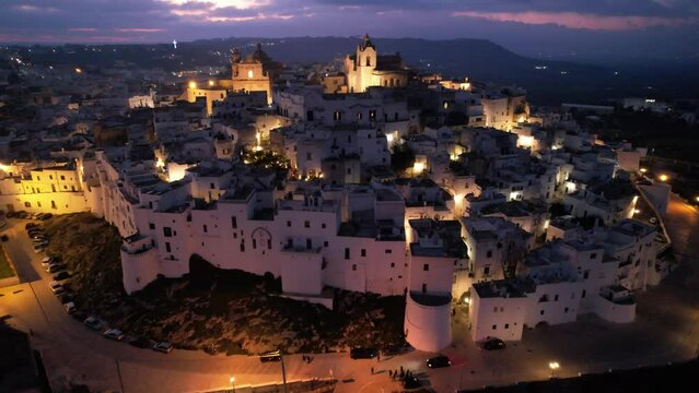 Vista aerea di Ostuni la citt&agrave; bianca al tramonto, nella valle d'itria in puglia