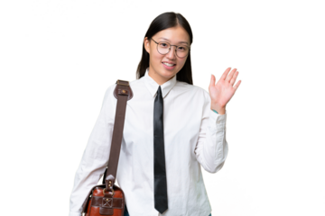 Young Asian business woman over isolated background saluting with hand with happy expression
