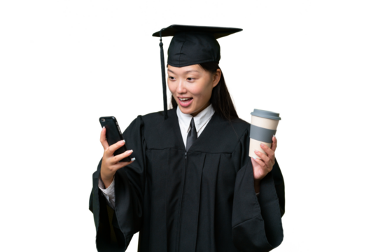Young university graduate Asian woman over isolated background holding coffee to take away and a mobile