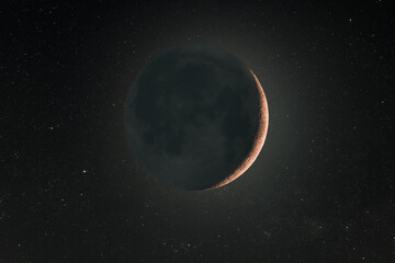 A thin crescent moon with earth shine and background stars