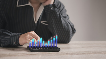 Businessman using mobile for analytics and data management to study database corporate strategy for finance  operation sales marketing