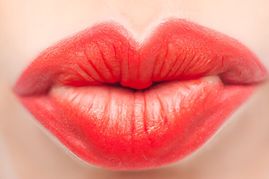 Beautiful woman red pursed lips