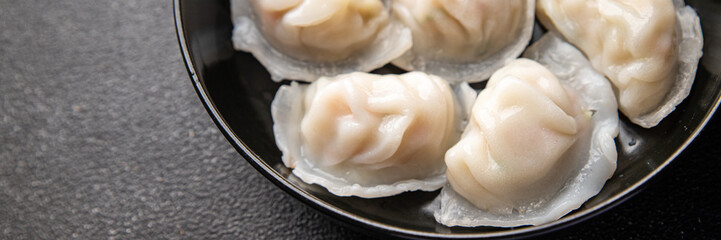 dim sum dumplings rice flour dough Chinese food meal snack on the table copy space food background rustic top view