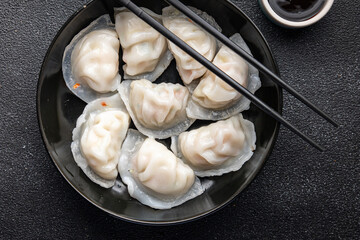 dim sum dumplings rice flour dough Chinese food meal snack on the table copy space food background rustic top view