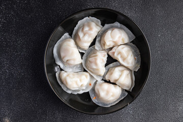 dim sum dumplings rice flour dough Chinese food meal snack on the table copy space food background...