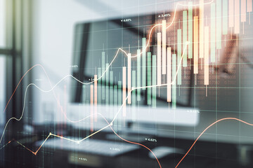 Multi exposure of abstract financial graph on laptop background, financial and trading concept