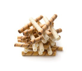 Crispy wafer rolls on a white background.