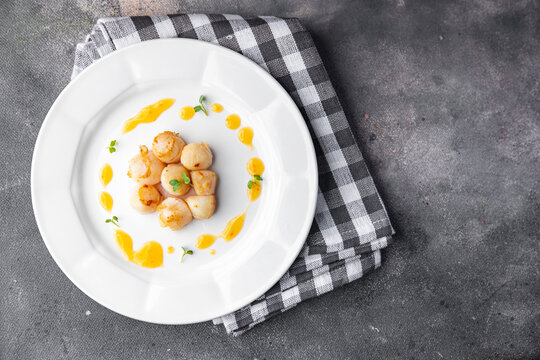 sea scallop fresh seafood fried meal food snack on the table copy space food background rustic top view