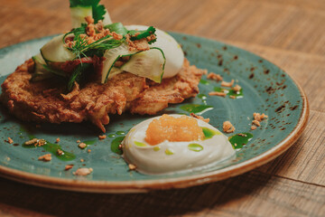 Modern restaurant fresh dish lies on a wooden table in a restaurant