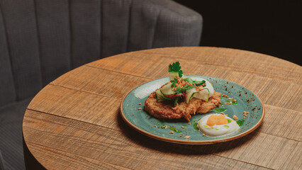 Modern restaurant fresh dish lies on a wooden table in a restaurant