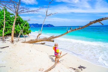happy child on the beach in krabi thailand, poda island, model shooting 