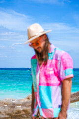 portrait of a man on the beach in krabi thailand with sunglasses, poda island, model shooting 