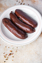 black pudding fresh bloody sausage meal food snack on the table copy space food background rustic...