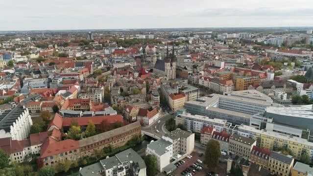 Flight over the city center of halle saale. view of the market church, red tower, cathedral and new residence. Saline and historic old town of Halle.
