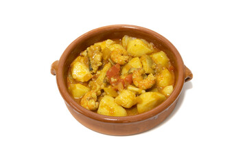 Potato stew with cod, served in a clay bowl. Isolated on white background. Spanish food concept.
