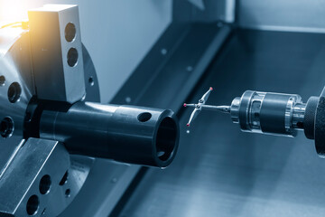 The modular touch probe checking the tube parts on CNC lathe machine.