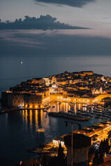 Iconic aerial view of Dubrovnik old town at dusk, creative edit, Croatia